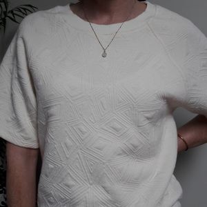 Super cute white t shirt.